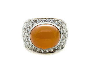 classic ring with a yellow topaz stone on white background