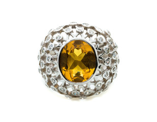 classic ring with a yellow topaz stone on white background