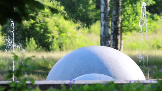 Spherical stone in fountain