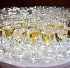 Rows of champagne and wine glasses for party and wedding