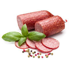 Salami smoked sausage, basil leaves and peppercorns isolated on white background cutout