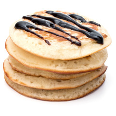 Pancakes  stack with chocolate syrup on white background