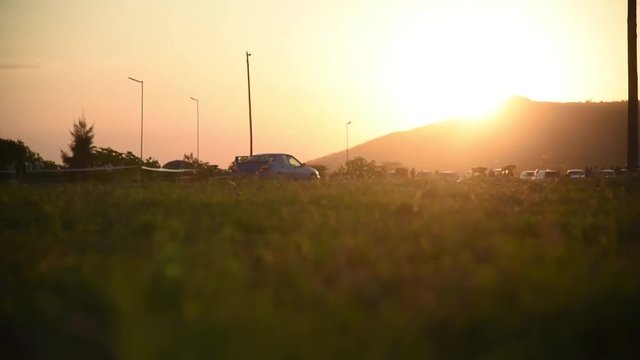 Racing sports car at sunset