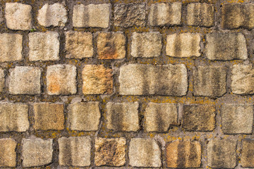 The texture of the wall of stone. Masonry. Stonewall Wallpaper.