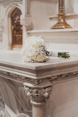 wedding bouquet of roses in the church