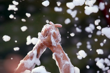 raised by human hands in the suds at the concert