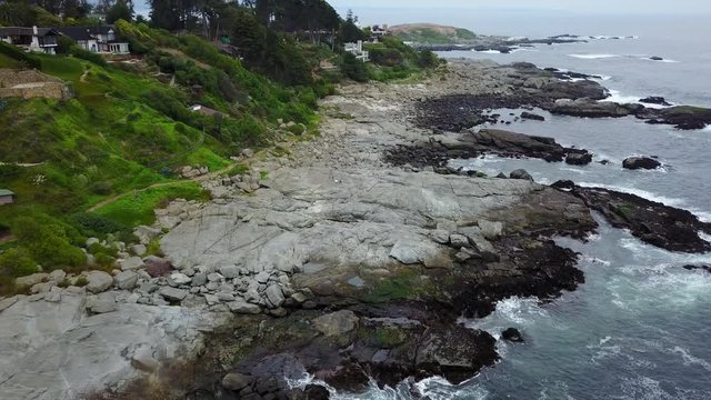 Aerial Footage, of a rocky shore at zapallar