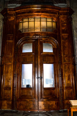 Rome, Italy - September 29, 2013: Church of St. Peter, Inside Interior: Old Arched wooden door.