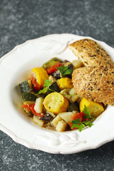 Vegetable ragout. Vegetarian stew made of zucchini, eggplants, onions, potato, and tomatoes with herbs.
