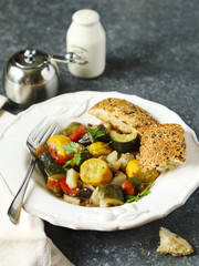 Vegetable ragout. Vegetarian stew made of zucchini, eggplants, onions, potato, and tomatoes with herbs.
