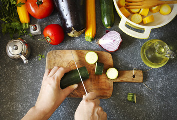 Fresh vegetables and cooking pan on table, top view. Healthy food and eating concept. Preparing for...