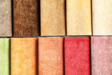 Fototapeta premium Fabric samples of different colors for interior design as background