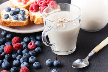 berry smoothie with oatmeal in a glass, healthy eating diet concept