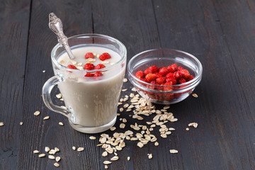 Healthy breakfast: overnight oats with fresh blueberries in a glass jar
