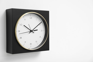 Stylish clock on white background. Time concept