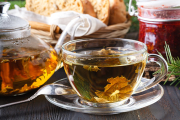 Colorful fresh herbal brewed teas in glass teapots
