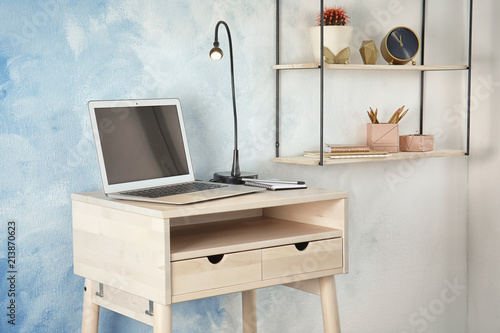High Wooden Table With Laptop As Stand Up Workplace In Modern
