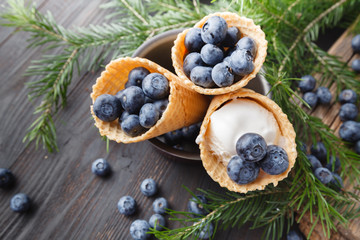 Ice cream flavor in cones blueberry. Summer and Sweet menu concept