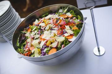 a delicious salad in a bowl on a table