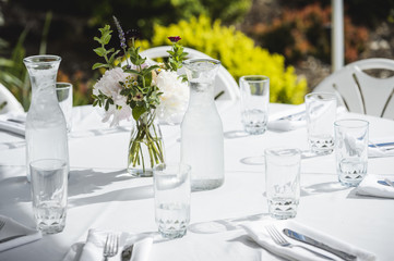 a beautiful table setting at an outdoor cafe