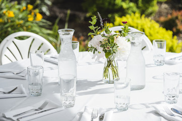a beautiful table setting at an outdoor cafe