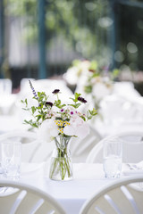 a beautiful table setting at an outdoor cafe