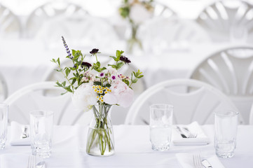 a beautiful table setting at an outdoor cafe