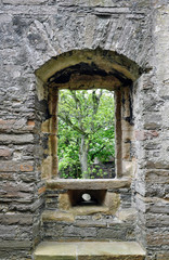 view from the ancient stone window of the castle