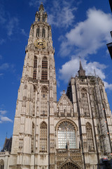 Fototapeta na wymiar Cathedral of our lady in Antwerp, Belgium under clear blue sky in Sunny good weather day in spring