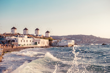 Old traditional windmills over the town of Mykonos.