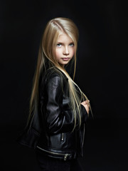 Plakat Portrait of the beautiful child on black background