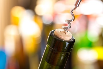 Opening a Wine Bottle with Corkscrew