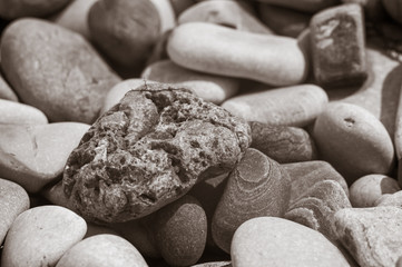 boulders and colorful pebbles on the beach