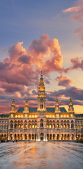 Fototapeta na wymiar Vienna's Town Hall (Rathaus) in the evening after the rain