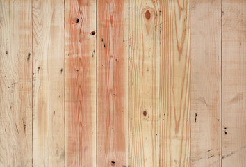 Wood plank wall with vertical stripe pattern.