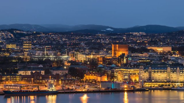 Oslo city skyline day to night timelapse at Oslo City Hall and Harbour, Oslo Norway 4K Time Lapse