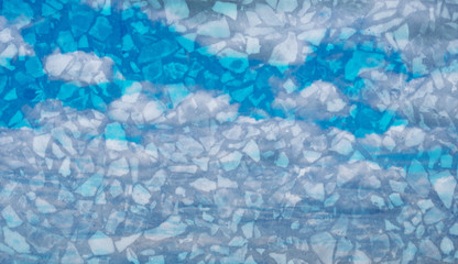 Double exposure of sweet pastel colored cloud with terrazzo stone texture, soft cloudy with gradient pastel color background.