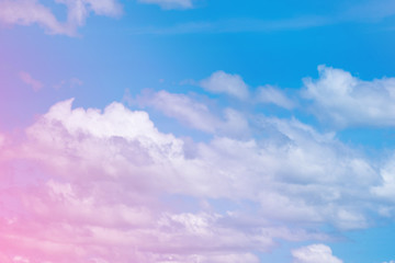 Sweet pastel colored cloud and sky with sun light, soft cloudy with gradient pastel color background.