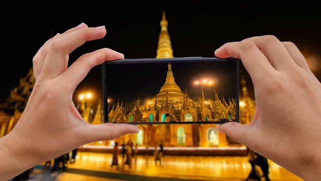 Cinemagraph of Taking Mobile Photo of Golden Shwedagon Pagoda in Myanmar (Burma)
