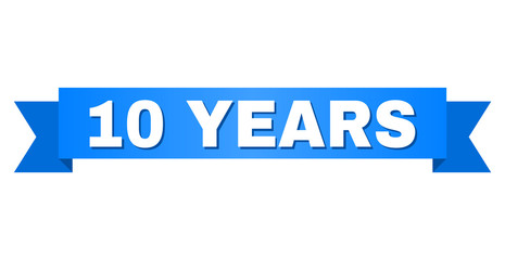 10 YEARS text on a ribbon. Designed with white caption and blue tape. Vector banner with 10 YEARS tag.