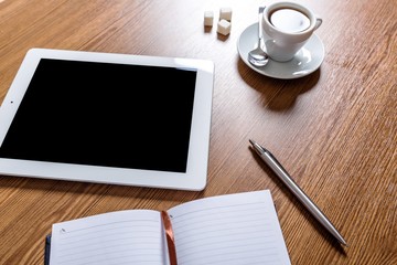 Desk with Blank Tablet, Coffee and Agenda