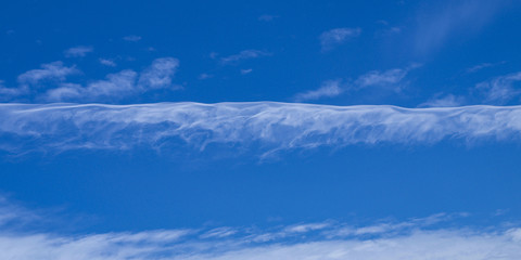 Fototapeta premium Magnificent white Contrail Cirrus cloud in blue sky. Australia.