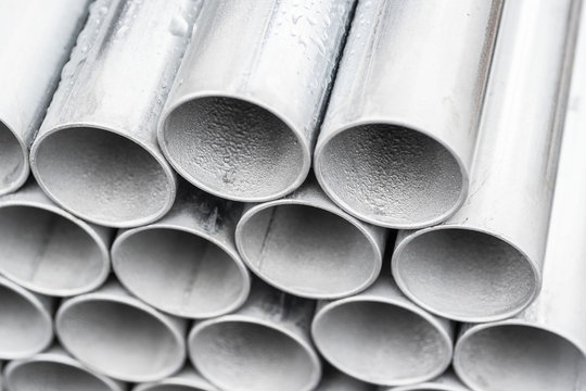 Close-up stack of metal pipe