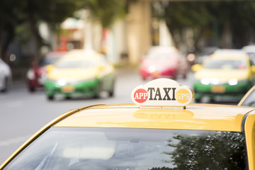 close up yellow taxi car on street 