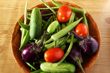  fresh vegetables on wooden background 