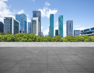 Panoramic skyline and buildings with empty square floor.