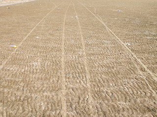 Bicycle wheel on sand