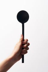 cropped image of woman holding salad spoon isolated on white background