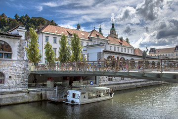 Cityscape view on Ljubljanica river with butchers bridge