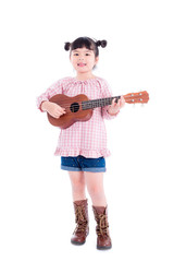 Little asian girl playing ukulele over white background